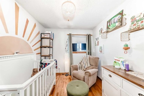 203 Hidden Spring Green Nw, Calgary, AB - Indoor Photo Showing Other Room