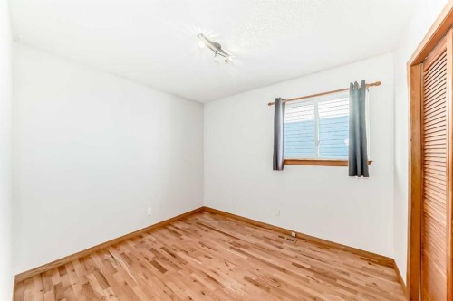 203 Hidden Spring Green Nw, Calgary, AB - Indoor Photo Showing Other Room