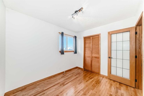 203 Hidden Spring Green Nw, Calgary, AB - Indoor Photo Showing Other Room