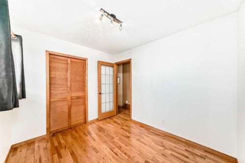 203 Hidden Spring Green Nw, Calgary, AB - Indoor Photo Showing Other Room