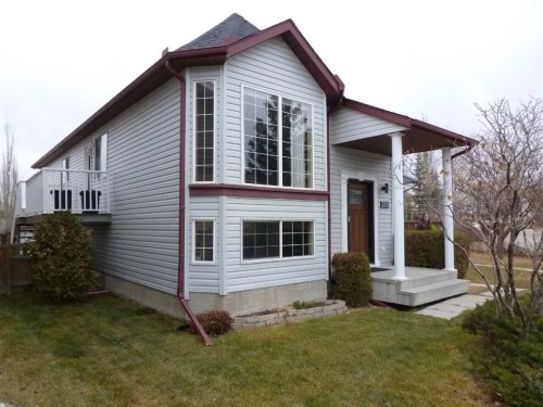 203 Hidden Spring Green Nw, Calgary, AB - Outdoor