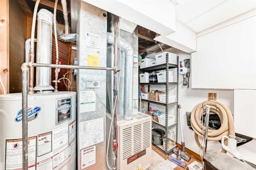 203 Hidden Spring Green Nw, Calgary, AB - Indoor Photo Showing Basement