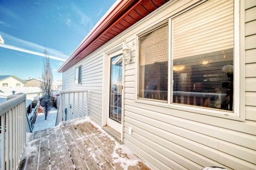203 Hidden Spring Green Nw, Calgary, AB - Outdoor With Deck Patio Veranda With Exterior