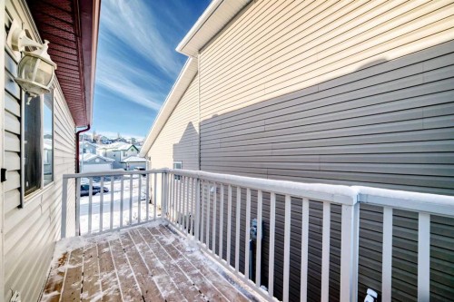203 Hidden Spring Green Nw, Calgary, AB - Outdoor With Deck Patio Veranda With Exterior