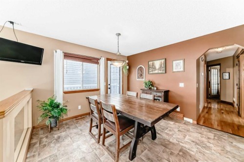 203 Hidden Spring Green Nw, Calgary, AB - Indoor Photo Showing Dining Room