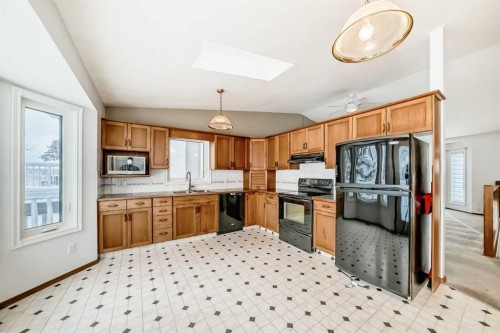 189 Balsam Crescent, Olds, AB - Indoor Photo Showing Kitchen With Double Sink