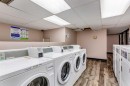 208-4944 Dalton Drive Nw, Calgary, AB  - Indoor Photo Showing Laundry Room 