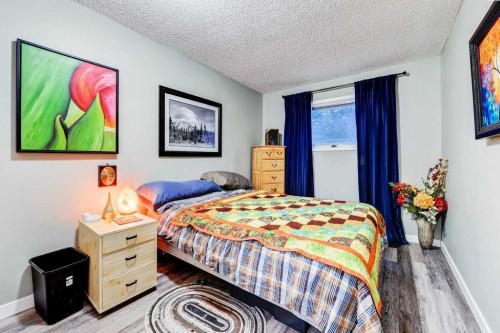 28 Hawktree Circle Nw, Calgary, AB - Indoor Photo Showing Bedroom
