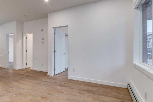 3201-6 Merganser, Chestermere, AB - Indoor Photo Showing Other Room