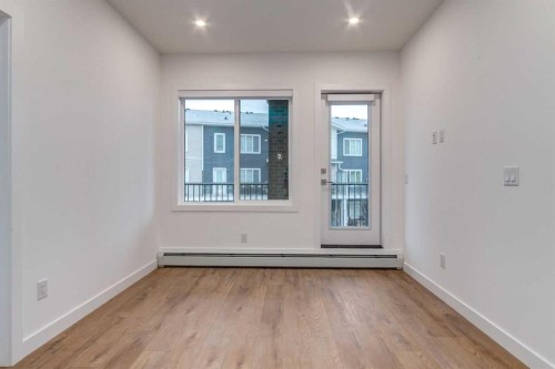 3201-6 Merganser, Chestermere, AB - Indoor Photo Showing Other Room