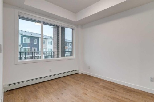 3201-6 Merganser, Chestermere, AB - Indoor Photo Showing Other Room