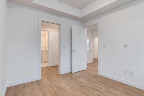 3201-6 Merganser, Chestermere, AB - Indoor Photo Showing Other Room