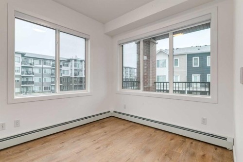 3201-6 Merganser, Chestermere, AB - Indoor Photo Showing Other Room