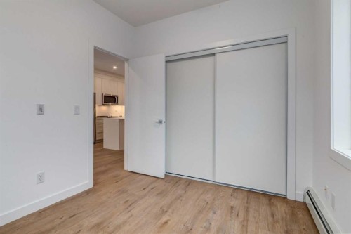 3201-6 Merganser, Chestermere, AB - Indoor Photo Showing Other Room