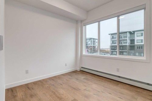 3201-6 Merganser, Chestermere, AB - Indoor Photo Showing Other Room