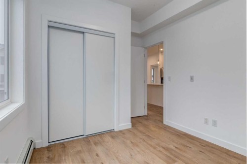 3201-6 Merganser, Chestermere, AB - Indoor Photo Showing Other Room