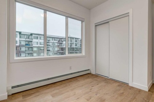 3201-6 Merganser, Chestermere, AB - Indoor Photo Showing Other Room