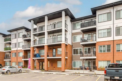3201-6 Merganser, Chestermere, AB - Outdoor With Balcony With Facade