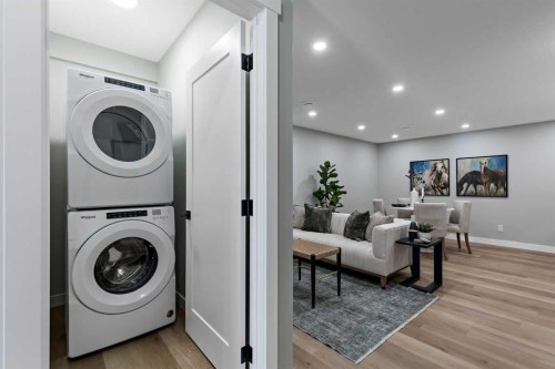 8 Creekview Manor Sw, Calgary, AB - Indoor Photo Showing Laundry Room