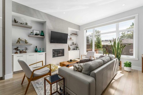 2432 32 Street Sw, Calgary, AB - Indoor Photo Showing Living Room With Fireplace