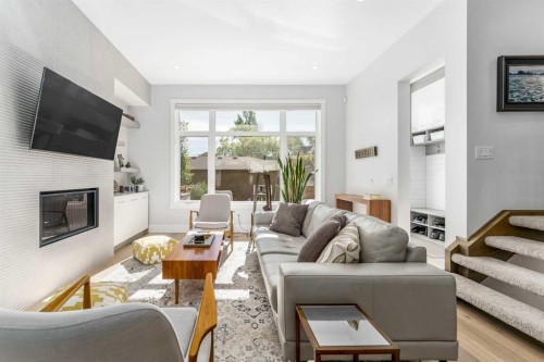 2432 32 Street Sw, Calgary, AB - Indoor Photo Showing Living Room With Fireplace