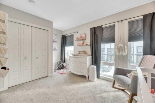 413-338 Seton Circle Se, Calgary, AB - Indoor Photo Showing Bedroom