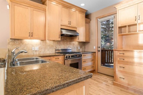 4-124 Silvertip Ridge, Canmore, AB - Indoor Photo Showing Kitchen With Double Sink With Upgraded Kitchen