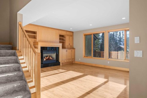 4-124 Silvertip Ridge, Canmore, AB - Indoor With Fireplace