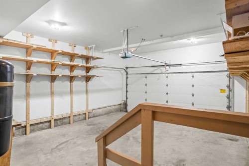 4-124 Silvertip Ridge, Canmore, AB - Indoor Photo Showing Garage