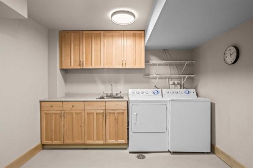 4-124 Silvertip Ridge, Canmore, AB - Indoor Photo Showing Laundry Room