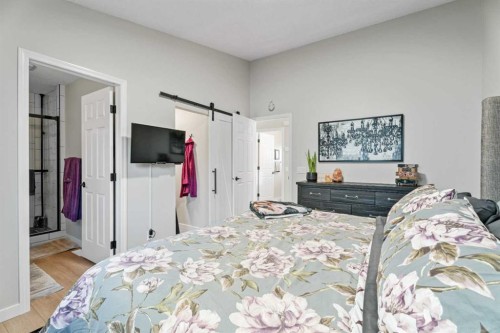 117 Rocky Ridge Landing Nw, Calgary, AB - Indoor Photo Showing Bedroom