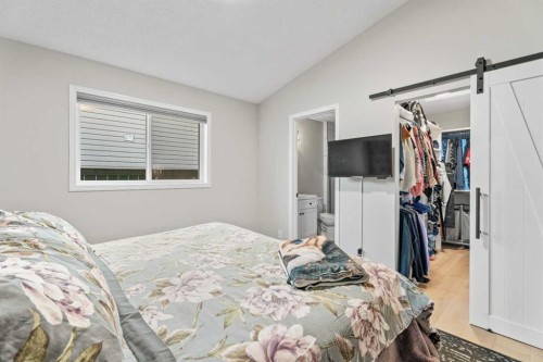 117 Rocky Ridge Landing Nw, Calgary, AB - Indoor Photo Showing Bedroom