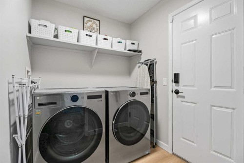 117 Rocky Ridge Landing Nw, Calgary, AB - Indoor Photo Showing Laundry Room