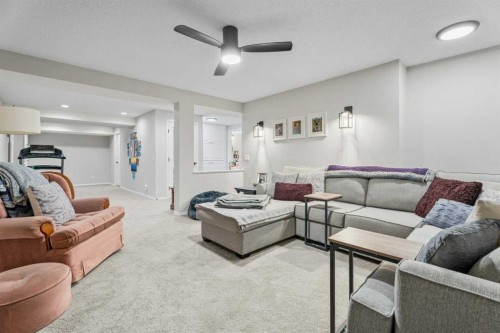 117 Rocky Ridge Landing Nw, Calgary, AB - Indoor Photo Showing Living Room
