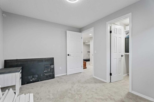 117 Rocky Ridge Landing Nw, Calgary, AB - Indoor Photo Showing Other Room