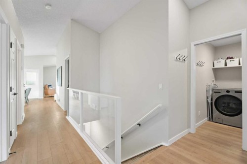 117 Rocky Ridge Landing Nw, Calgary, AB - Indoor Photo Showing Laundry Room