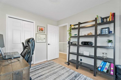 117 Rocky Ridge Landing Nw, Calgary, AB - Indoor Photo Showing Other Room