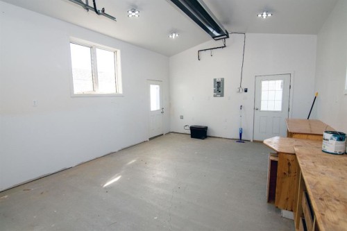 10 Westmount Drive, Cayley, AB - Indoor Photo Showing Garage