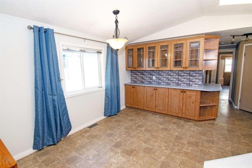 10 Westmount Drive, Cayley, AB - Indoor Photo Showing Other Room