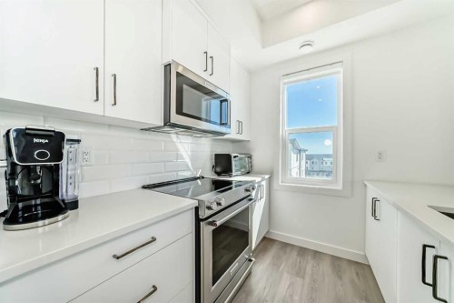 41-2117 81 Street Sw, Calgary, AB - Indoor Photo Showing Kitchen With Upgraded Kitchen