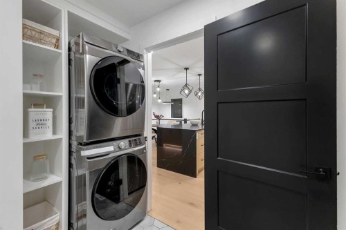 9419 Academy Drive Se, Calgary, AB - Indoor Photo Showing Laundry Room