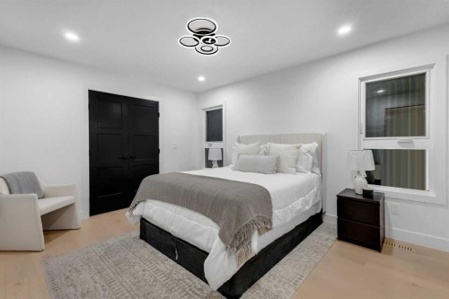9419 Academy Drive Se, Calgary, AB - Indoor Photo Showing Bedroom
