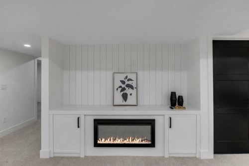 9419 Academy Drive Se, Calgary, AB - Indoor Photo Showing Living Room With Fireplace
