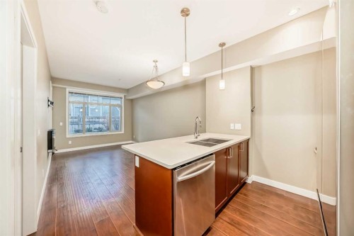 108-28 Auburn Bay Link Se, Calgary, AB - Indoor Photo Showing Kitchen With Double Sink