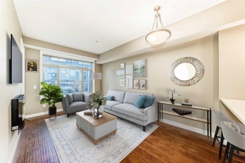 108-28 Auburn Bay Link Se, Calgary, AB - Indoor Photo Showing Living Room