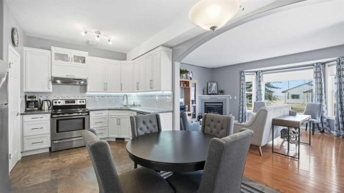 1-2 Hinshaw Drive, Sylvan Lake, AB - Indoor With Fireplace