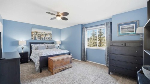 1-2 Hinshaw Drive, Sylvan Lake, AB - Indoor Photo Showing Bedroom