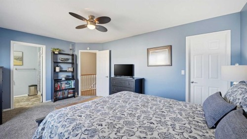 1-2 Hinshaw Drive, Sylvan Lake, AB - Indoor Photo Showing Bedroom