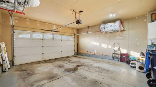 1-2 Hinshaw Drive, Sylvan Lake, AB - Indoor Photo Showing Garage