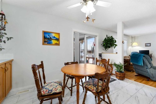 158 Somerglen Road Sw, Calgary, AB - Indoor Photo Showing Dining Room
